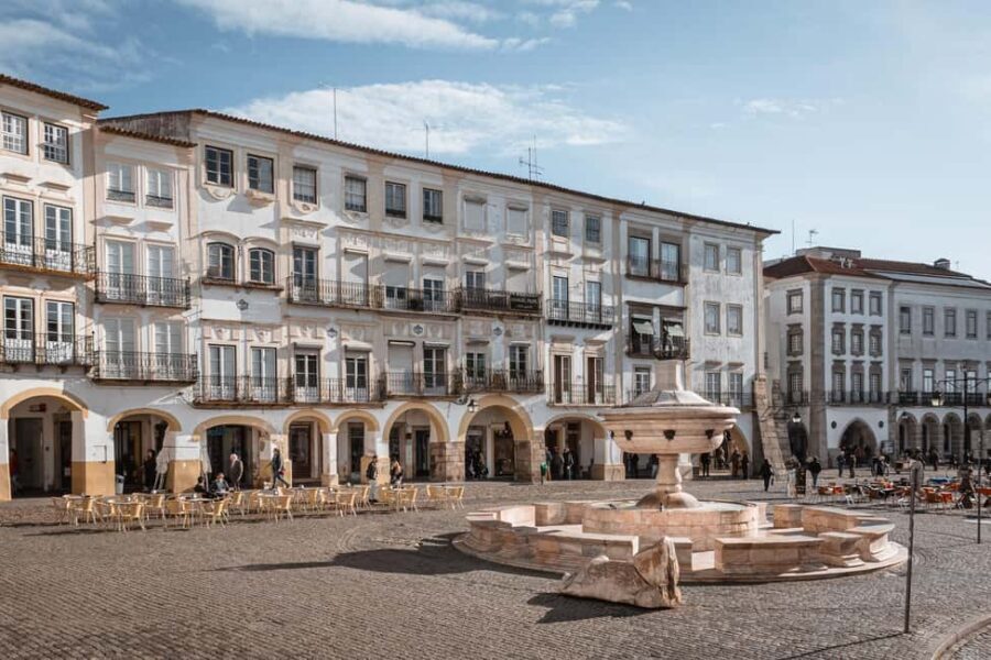 Évora: Flexible Walking Tour in Historic Center - Rua 5 de Outubro: the main street mood shift to crafts and local shops
