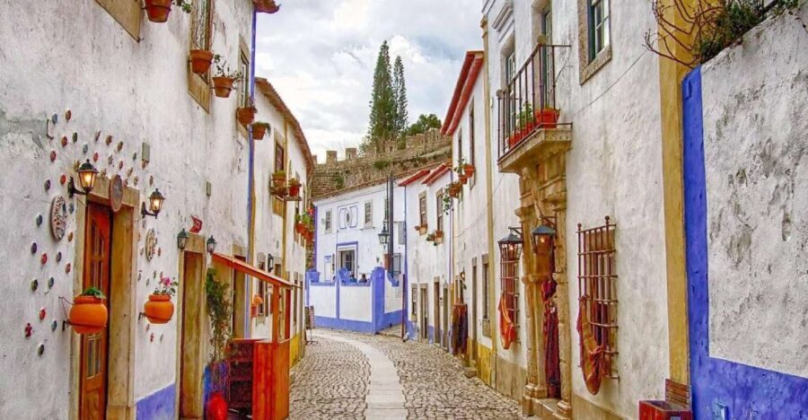 From Lisbon: Óbidos and Nazaré Private Half-Day Tour - Entering Óbidos’ Medieval World: Whitewashed Streets and Castle Views