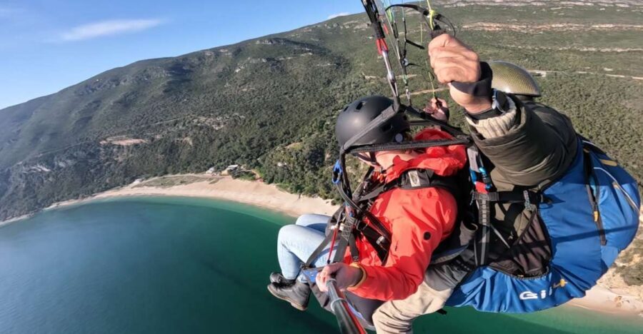 From Lisbon: Paragliding Pack (Flight+Video+Transportation) - The Tandem Flight: 20 Minutes Over Fonte da Telha, Bicas Beach, and Arrábida