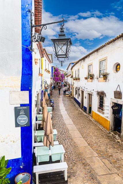 From Porto: Private Transfer to Lisbon until 3 Stops - Óbidos: medieval walls and Ginja liquor tasting
