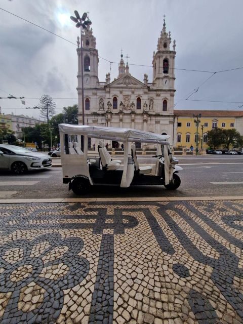 Full city of Lisbon on board of a private car - Alfama’s Alleys and the Miradouro Strategy