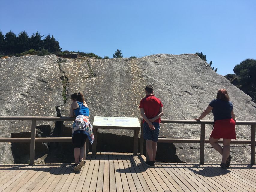 HIKING around Lisbon: Jurassic Dinosaur Trails of Espichel - Eating bread and cheese in a dinosaur footprint