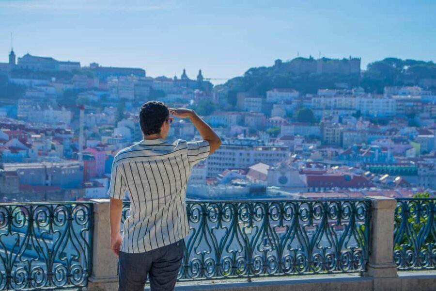 Lisbon: 3h tour in German to all viewpoints with local guide - Riding the cyan blue electric tuk-tuk (what it feels like)