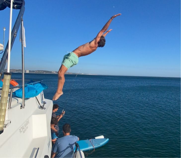 Lisbon: 4h Private Luxury Catamaran Tour with Welcome Drink - Water Time on the Tagus: Swimming, Jumps, and Sunbathing