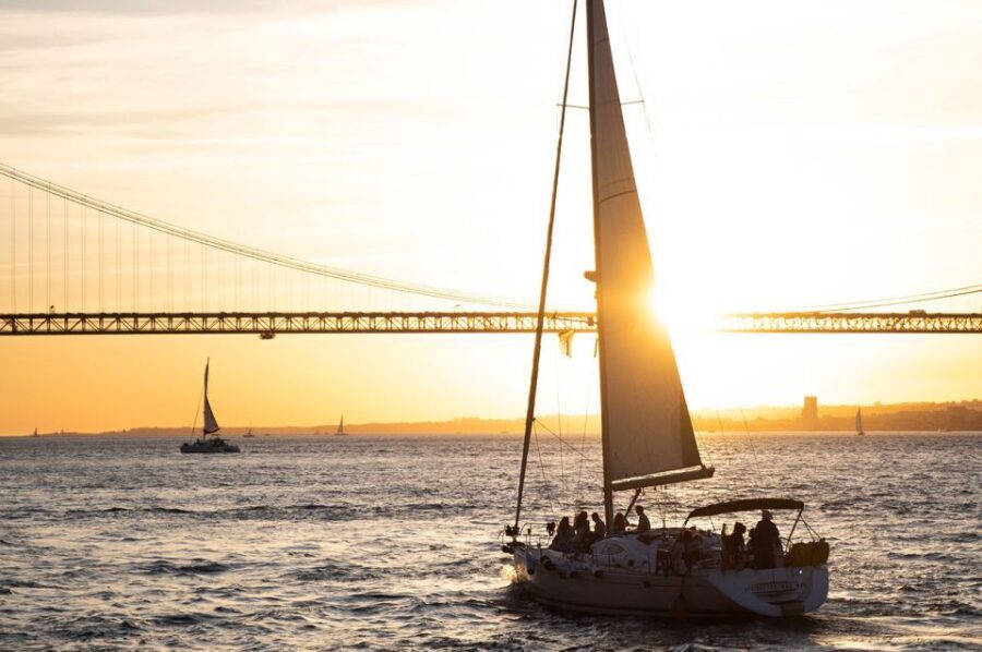 Lisbon: Alfama Charms, Tapas, Wine and Sunset Boat Cruise - The sunset sail on the Tagus: views, wine, and the reality of weather