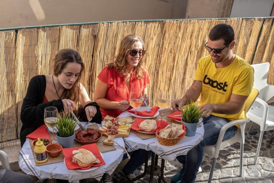 Lisbon: E-Bike Food Tour of Alfama and Old Town - Safety and guide style on tight streets
