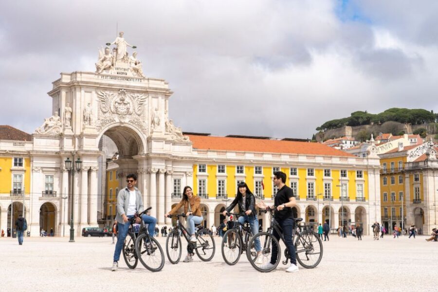 Lisbon: Guided Bike Tour, Helicopter Flight, and Boat Trip - Starting at Rossio: Praça Dom Pedro IV and the Barrio Alto rhythm
