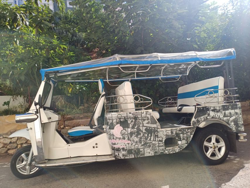 Lisbon: half day guided sightseeing tour by tuk tuk - Riding a tuk tuk through Lisbon’s hills and shortcuts