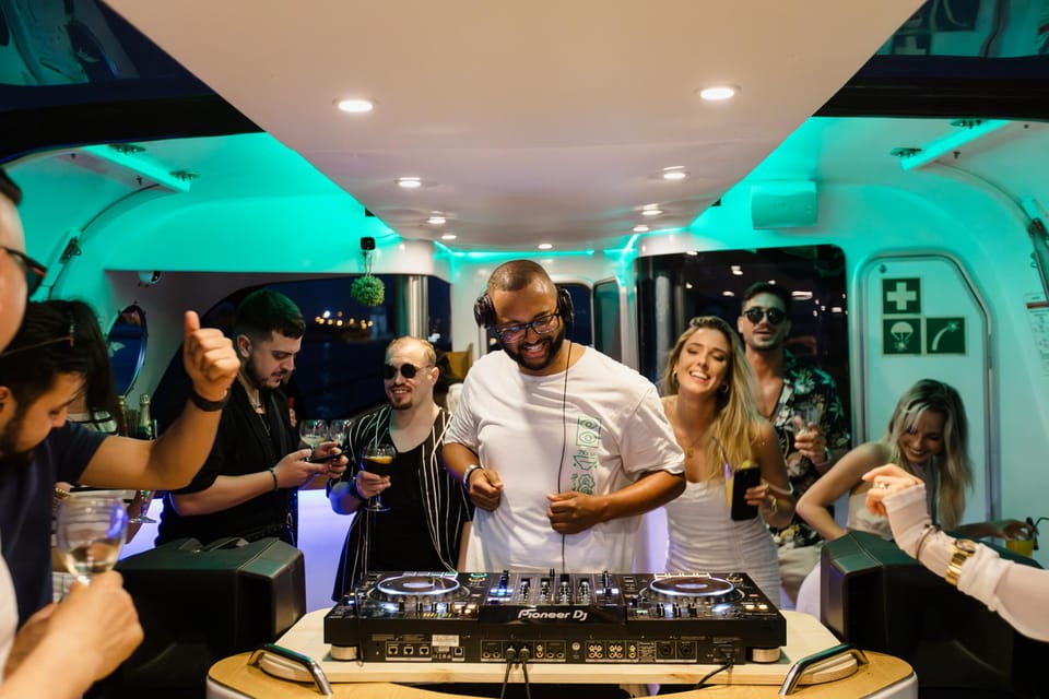 Lisbon: New Year's Cruise with DJ, Open Bar, Snacks and Wine - Inside Comfort: Glass Walls, Heated Areas, and Night Visibility