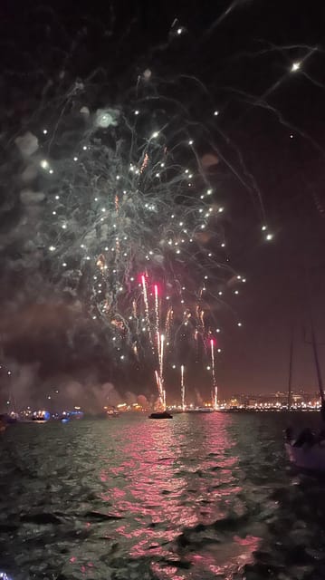 Lisbon: New Year's party on sailboat tour 2026 to 2027 - What you eat and drink at midnight (Portuguese-style, not just snacks)
