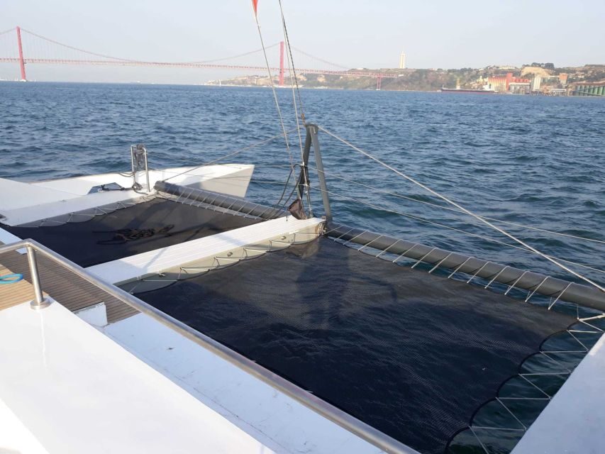 Lisbon: Private Catamaran Charter for up to 18-People - Lisbon City Sights: Christ Statue and the 25th of April Bridge