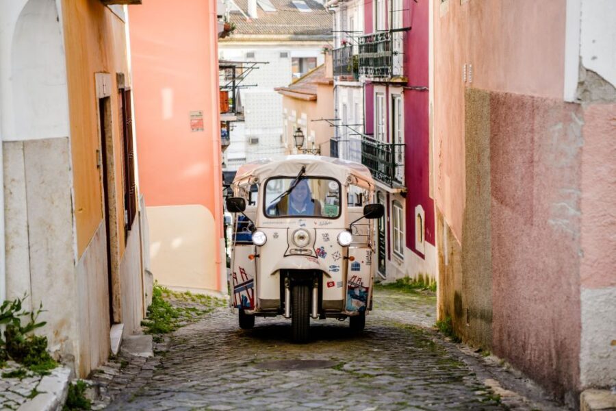 Lisbon: Private Food & Wine City Tour by Eco Tuk Tuk - The guide experience: local history that makes Lisbon make sense