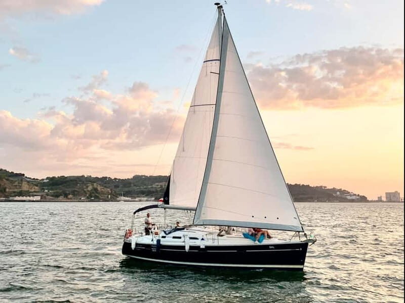 Lisbon: Private Sailing Experience with Locals - Past Belém Tower: the Lisbon light moment you came for