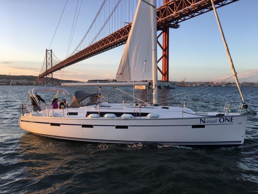 Lisbon: Private Sunset Cruise with Portuguese Wine - Sunset time on the Tagus: calm water, big light