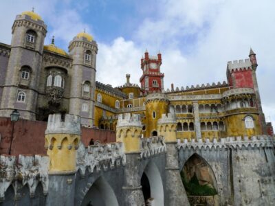Lisbon: Sintra, Cascais and Estoril Private Day Tour - Pena Palace: royal summer life, secret caves, and big garden views