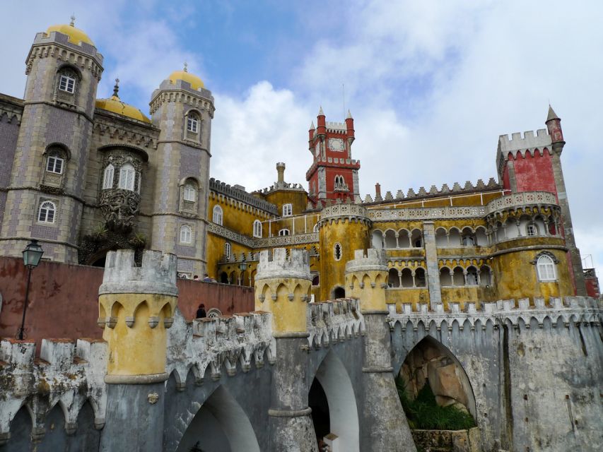 Lisbon: Sintra, Cascais and Estoril Private Day Tour - Pena Palace: royal summer life, secret caves, and big garden views