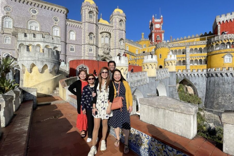 Lisbon: Sintra, Cascais, & Estoril Guided Day Tour - Pena Palace Terrace: Romantic Architecture With Big Mountain Views
