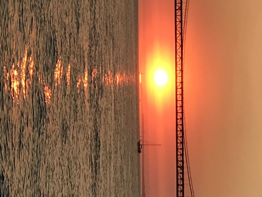 Lisbon: Sunset and Wine Luxury Catamaran Cruise - The Belem Tower Photo Stop: Quick Landmark Time