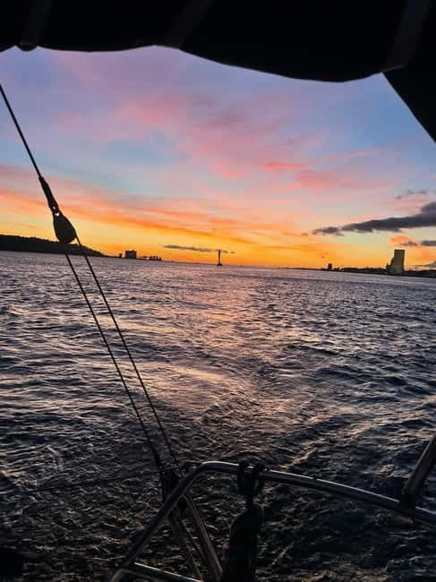 Lisbon: Sunset Sailing with Local Wine & Stunning Views - Getting There at Doca de Santo Amaro: Start Under the 25 de Abril Bridge