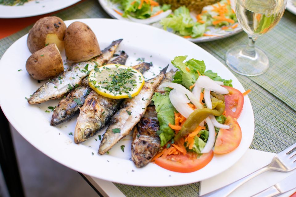 Lisbon Traditional Portuguese Food and Sightseeing Tour - Rossio Square, then straight into Portuguese flavors