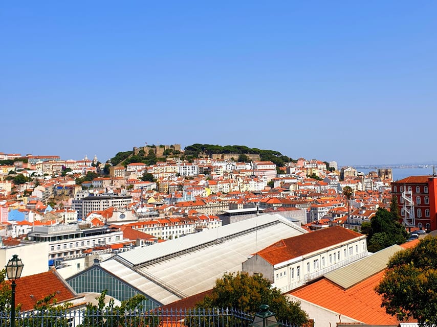 Lisbon: Tuk Tuk 2H Tour Lisbon with a Old Timer - Santa Justa elevator area: classic Lisbon without the hassle