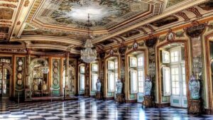 Mafra Convent, Queluz Palace & Ericeira Tour from Lisbon - Entering Queluz National Palace: French-style gardens and a queen’s cell
