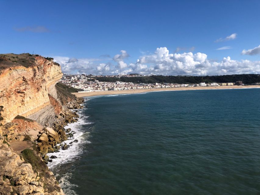 Nazaré: Big Wave Capital & Medieval Óbidos tour from Lisbon - Óbidos inside the castle walls: ginjinha, legends, and people-watching