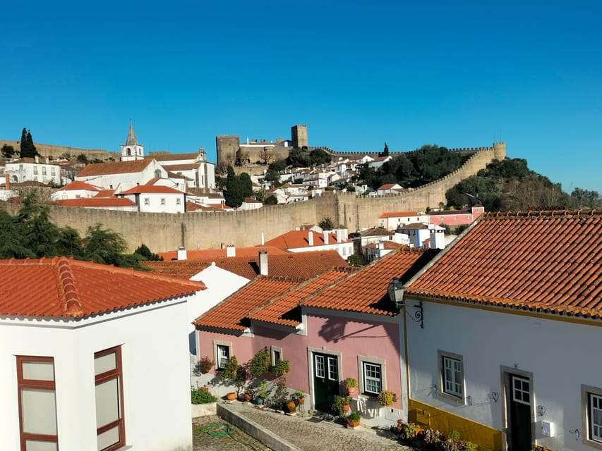 Óbidos (Medieval Town): Half-Day Private Tour from Lisbon - The taste stops: Ginjinha in a chocolate cup and a quick wine moment