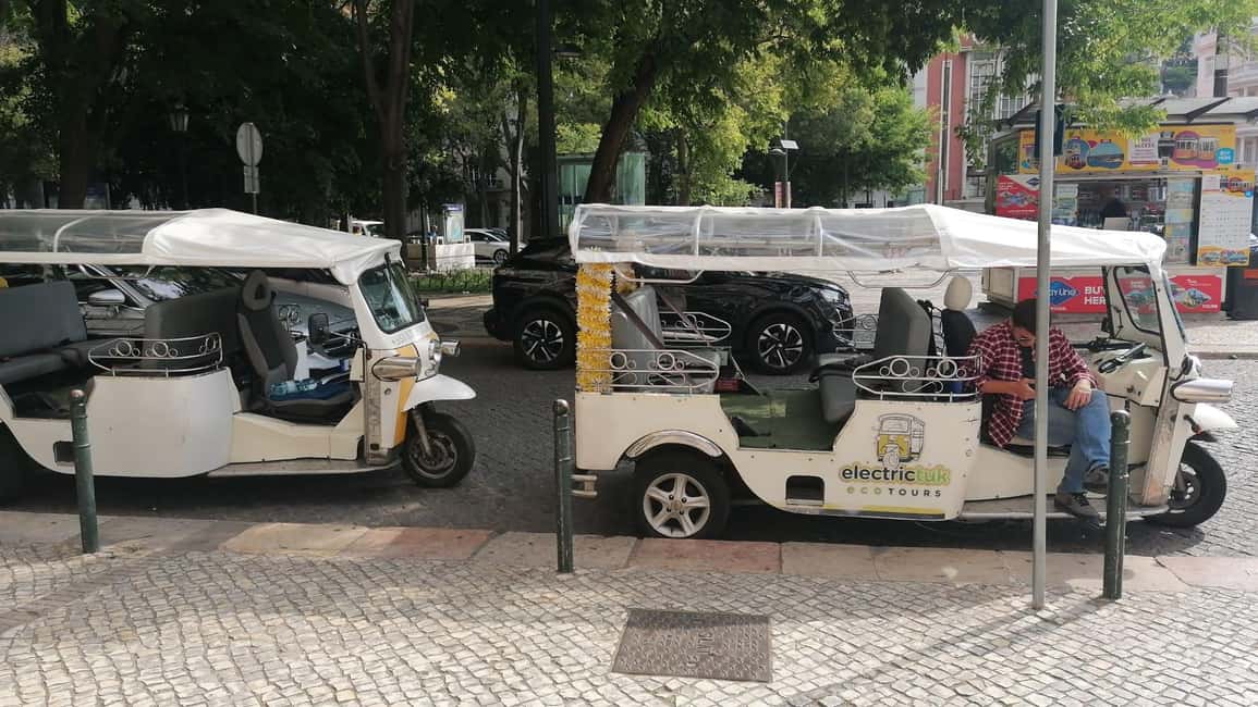 Travel to the Medieval part of Lisbon by Tuk Tuk - Passing Arco de Jesus and Madalena Church on the way to Alfama